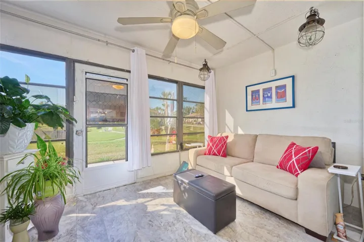 The sun room is a great extension to the home and provides amazing views!