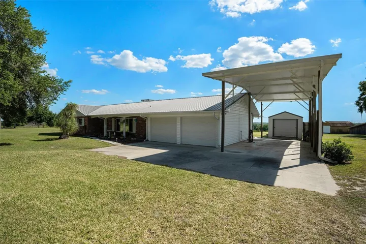 2-car garage and a designated RV area with ready-made septic and water hookups!