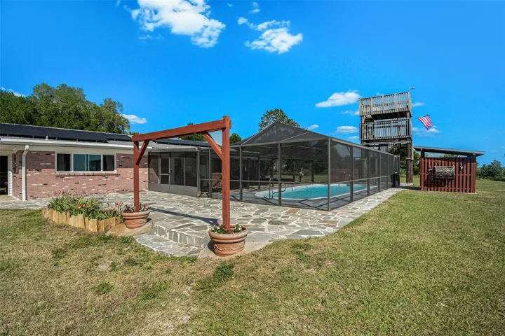 PAID solar panels. Pool. Exterior bath. A 17-foot observation tower