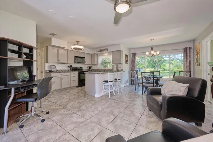 The space off of the kitchen has multiple uses!