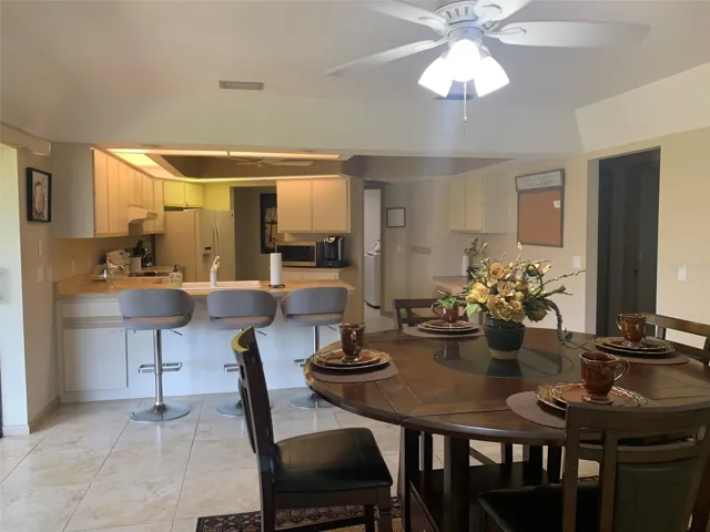 Family room currently being used as eating space