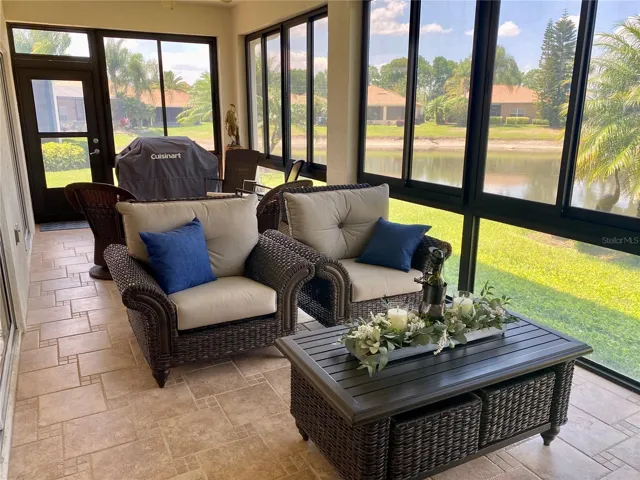 Florida room with tile floor and AC