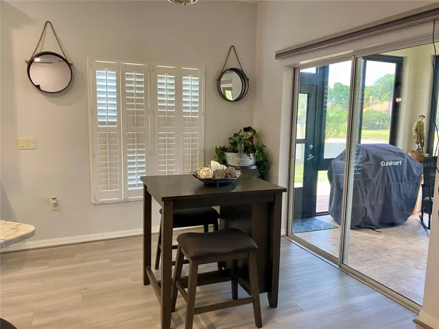 Kitchen Nook with double sliding doors to florida room