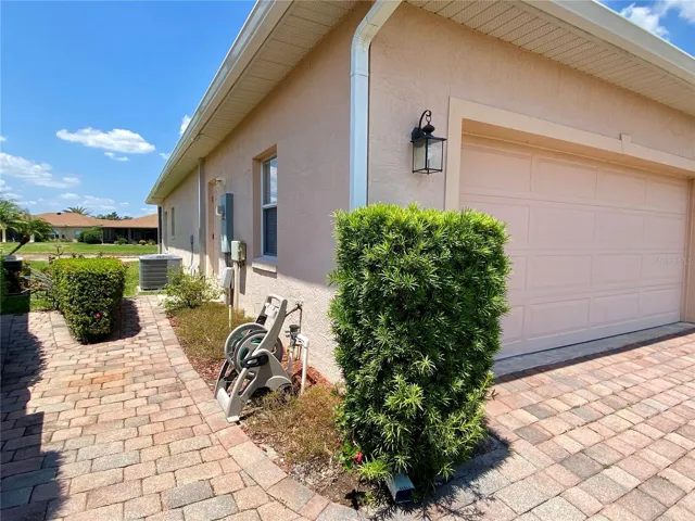 Side of home with service door