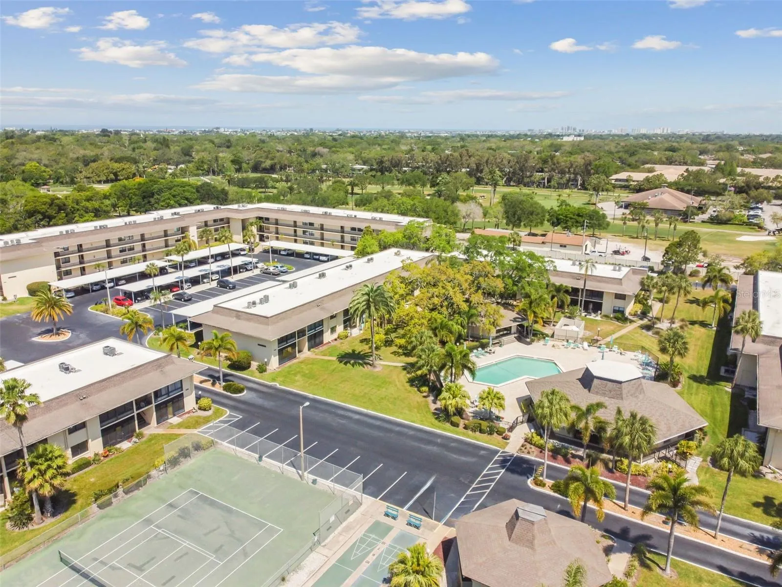 Great location within Villas De Golf.  Walk out your back porch, cross the lawn, and you're at the pool and clubhouse.  Cross the street and you're at the tennis/pickle ball, and shuffleboard courts.