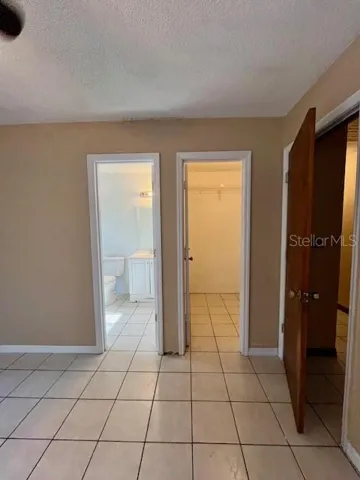 Main Master BR with full bath & walk-in closet