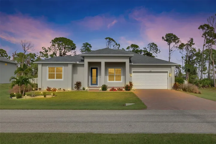 Home with 2 car attached garage.