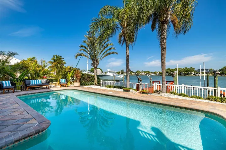 Maintenance free backyard to enjoy the heated saltwater pool all year