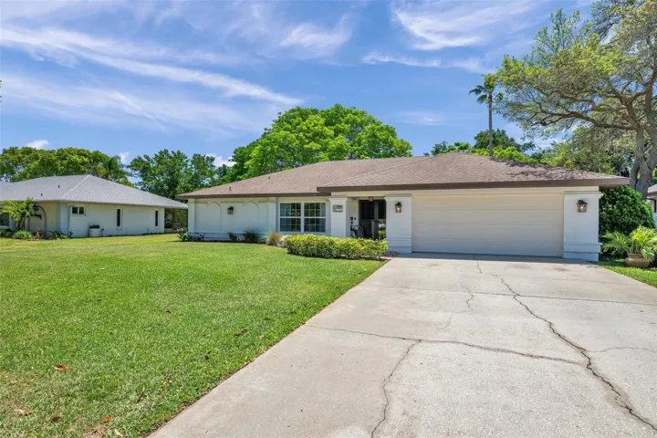 Two Car garage with plenty of driveway space