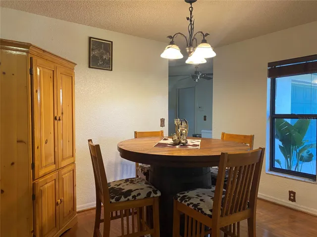 The doorway at the back of the picture leads to the kitchen