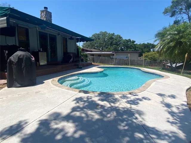 Swimming pool stays warmer with no screen cage.  Fenced in back-yard.