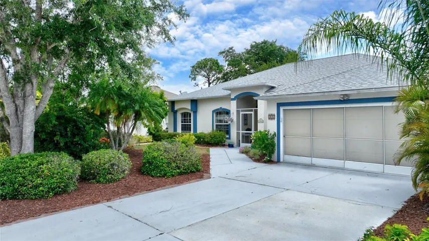 Mature landscaping defines this exterior