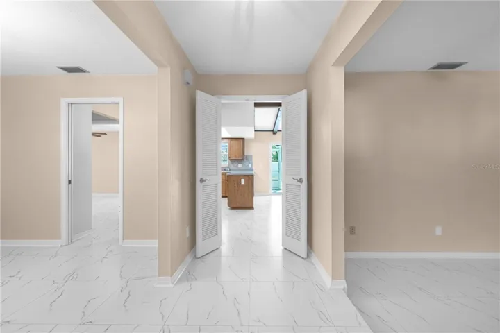 Foyer - Formal Dining (L)Formal Living Room (R)