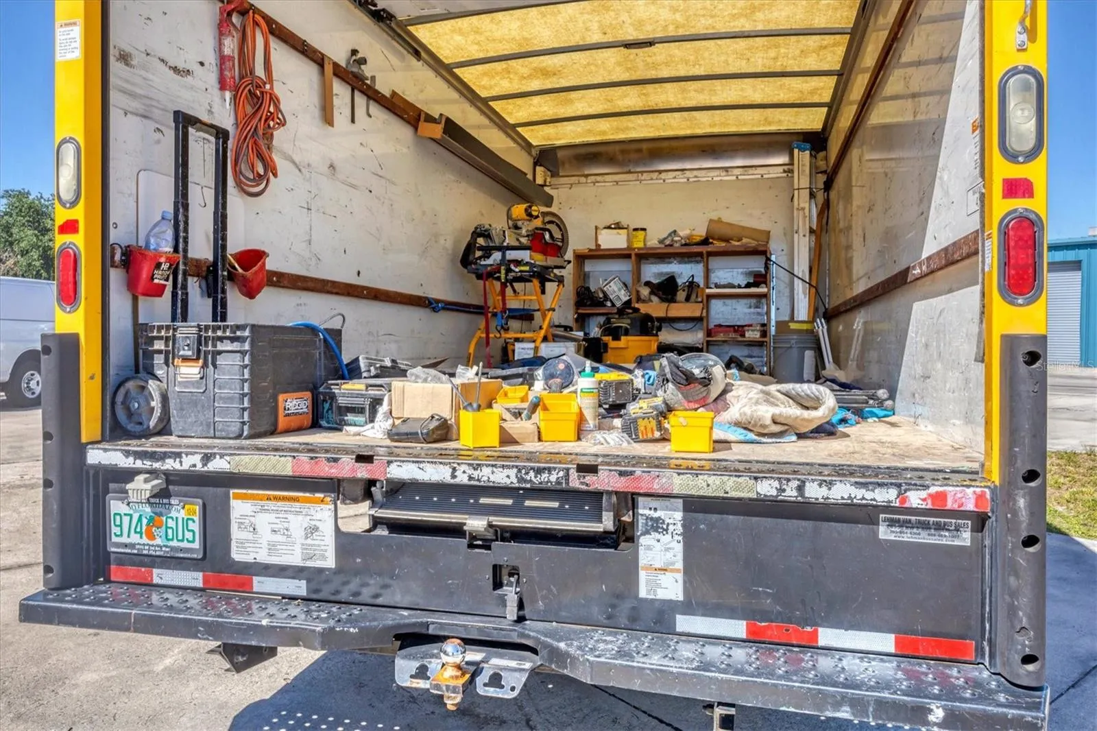 Truck for delivery of cabinets included in purchase of business.