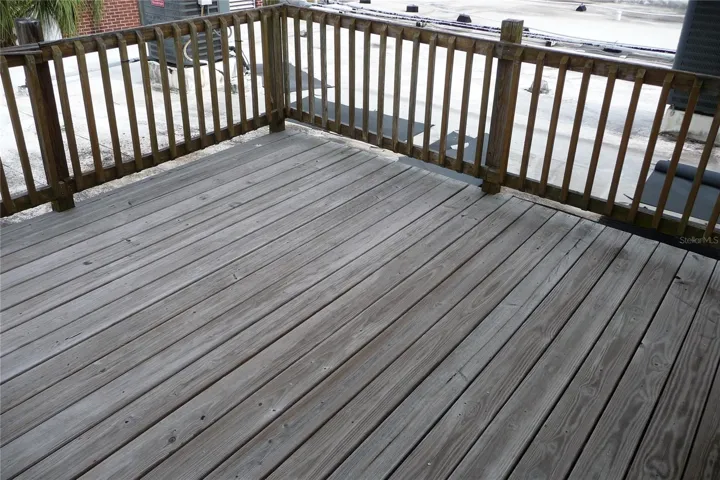 Back deck off apartment. No grills allowed per fire dept.