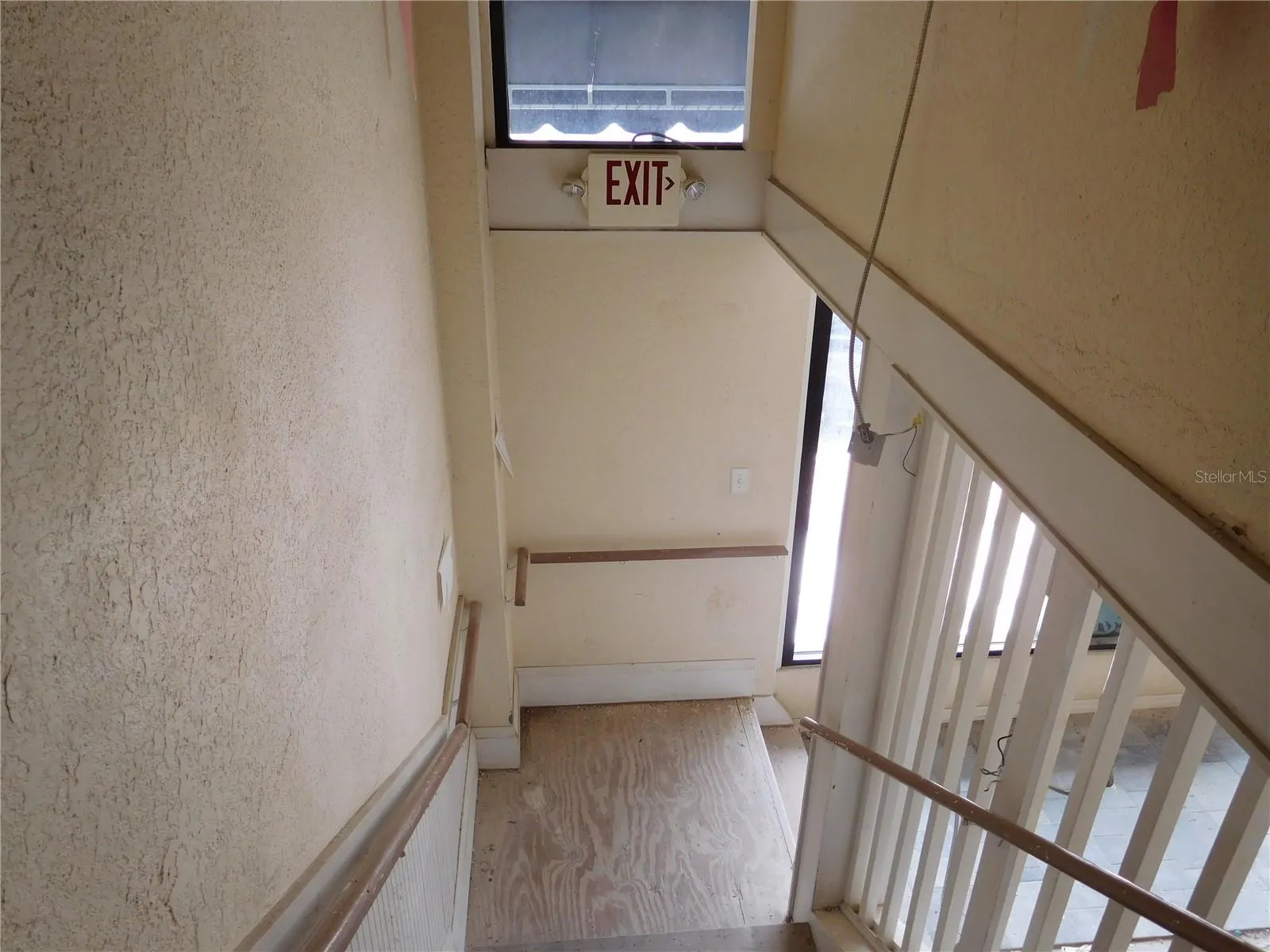 STAIRS GOING UP TO SECOND FLOOR.