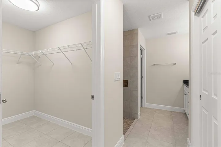 OWNERS SUITE BATHROOM AND WALK IN CLOSET