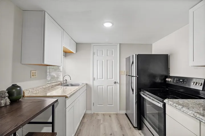 Upstairs unit kitchen.