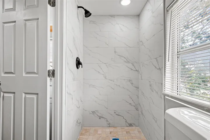 Upstairs unit shower.
