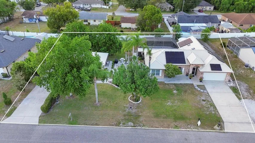 double lot with home and detached guest suite