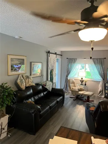 LIVINGROOM WITH LIGHT AND BRIGHT WINDOW