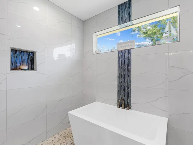 Soaking tub in the shower.