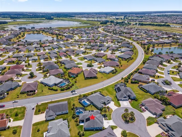 AERIAL looking Southwest - Okeechobee Executive and Belle Glade Championship GCs (upper right), Sharon Rose Wiechens Preserve (upper left), and Moyer Loop (travels from lower L to upper R)