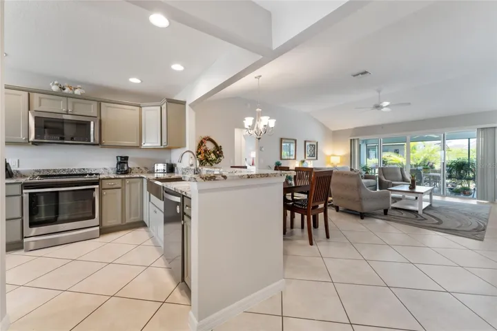 OPEN KITCHEN provides the opportunity to entertain guests during meal preparation & serving.