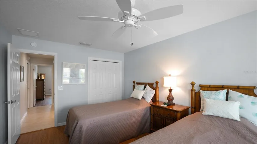 BEDROOM #3 has closet with CUSTOM ORGANIZATION SYSTEM