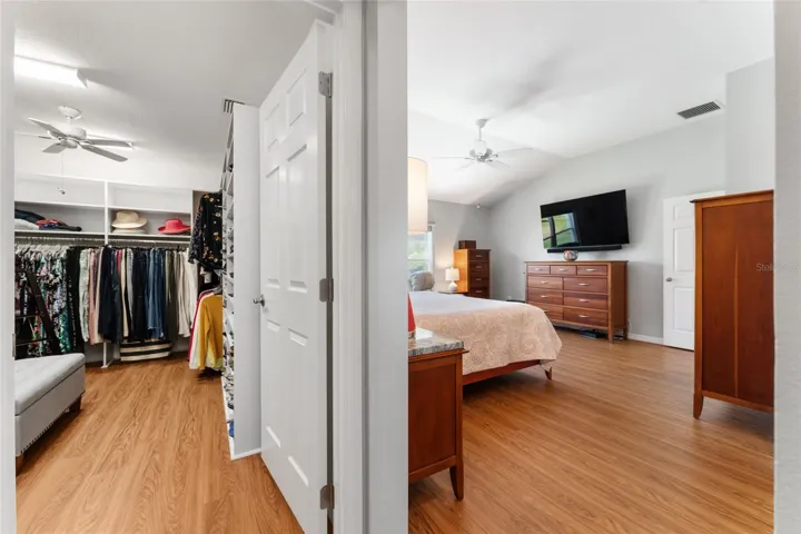 Huge WALK-IN CLOSET (L) & PRIMARY BEDROOM (R)