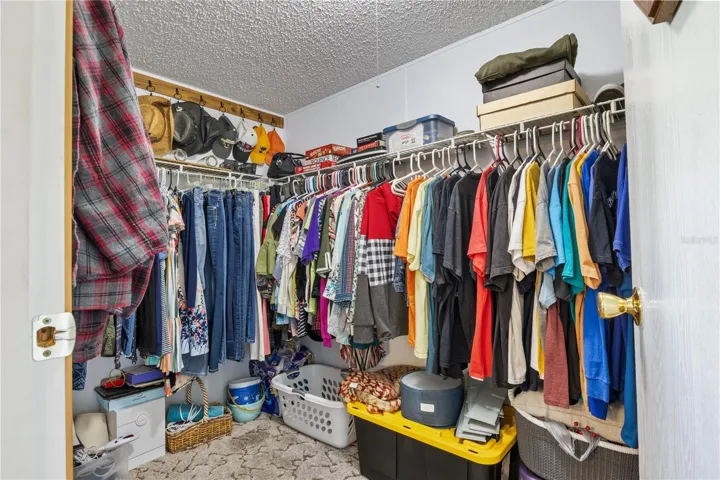 primary bedroom walk-in closet