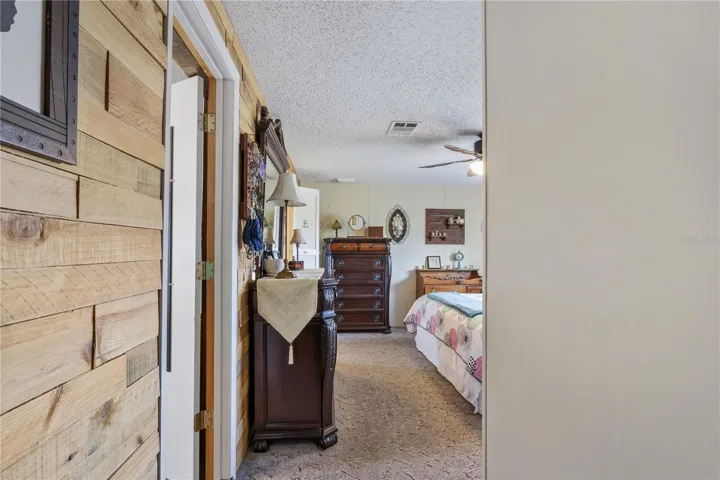 hallway to primary bedroom