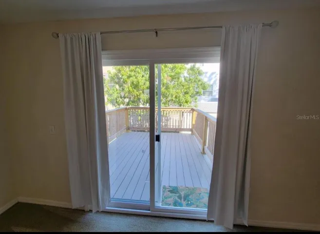 Sliding patio door out to reach deck