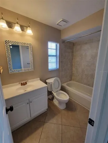 Primary Ensuite bathroom also walk in closet in master