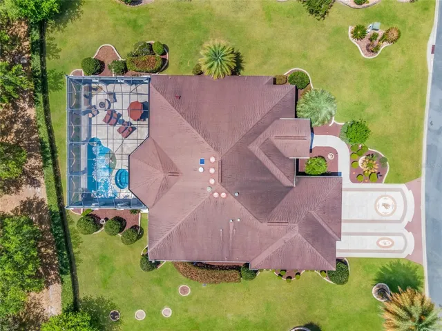 AERIAL OVERHEAD View shows the massive size of the OUTDOOR LIVING AREA in the rear of the home.
