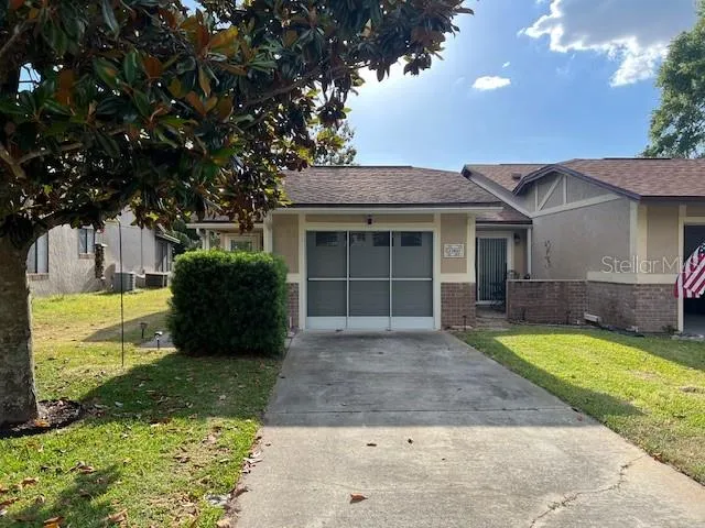 Front of house showing driveway, front porch and sidewalk