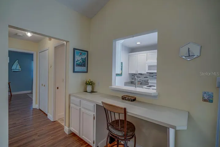 Desk in Living Room with laminate floor