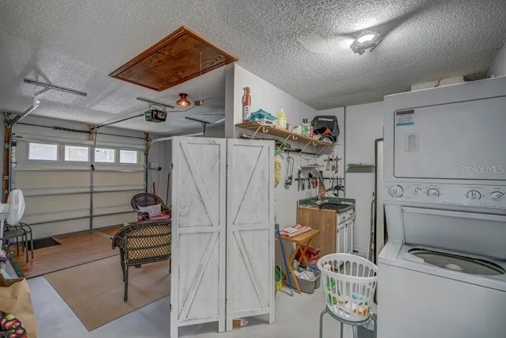 Garage with HW Heater, Laundry and HVAC