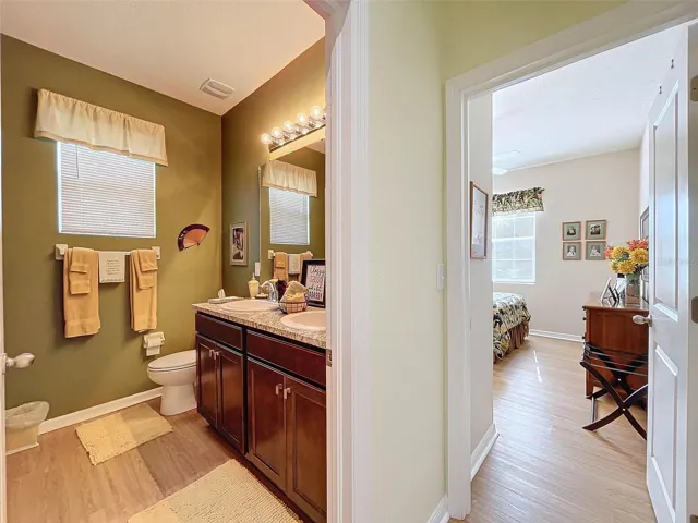 2nd Bathroom with view of 3rd Bedroom