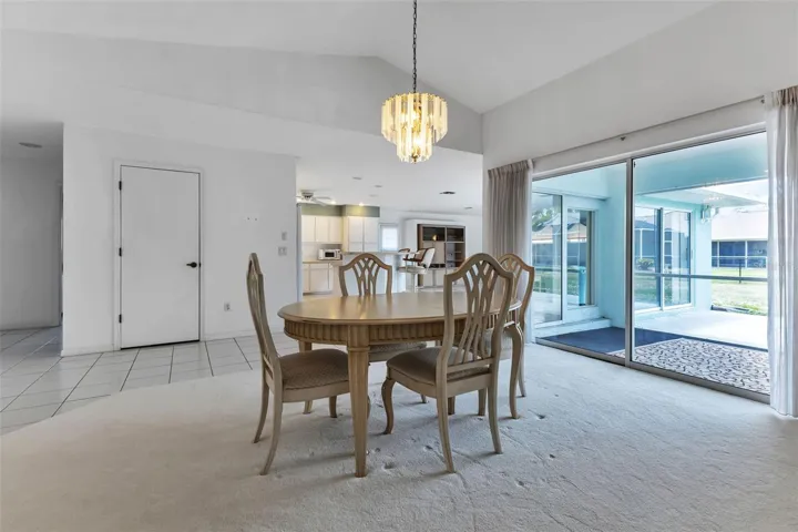 Dining room area has double sliding glass doors