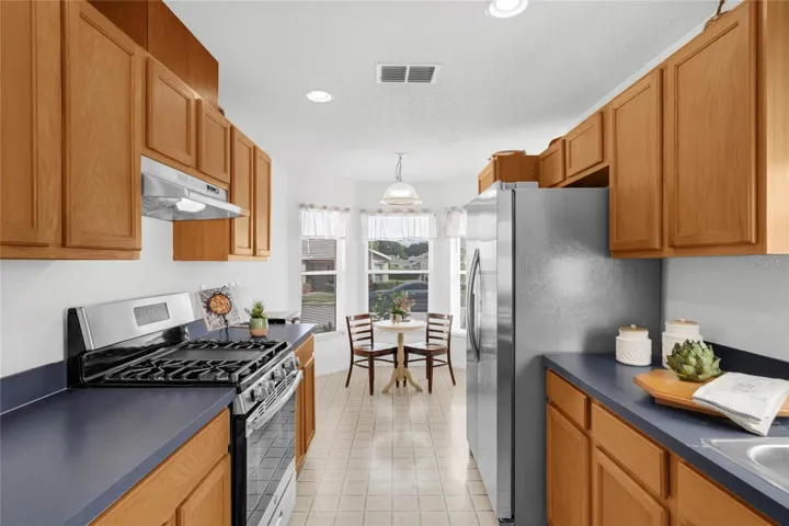 Stainless steel appliance package with gas  range