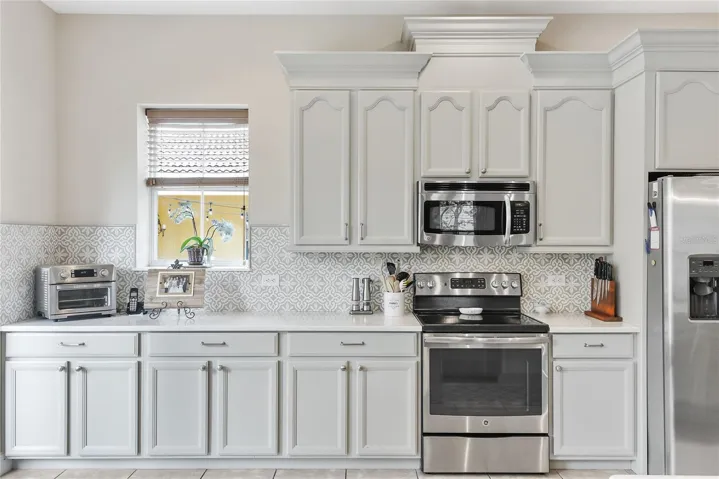 Stainless Steel Appliances and lots of cabinets