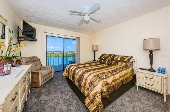 Primary Bedroom with sliding glass door to the balcony!