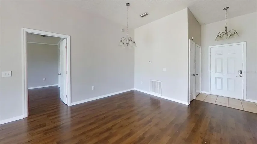 View of front entrance and family room area.
