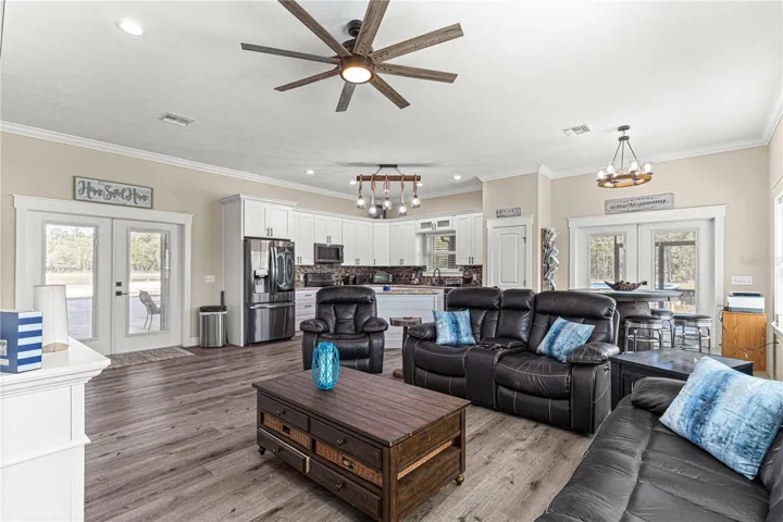 Crown molding & luxury vinyl planking throughout