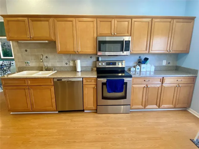 Beautiful wood cabinets and lots of counter space