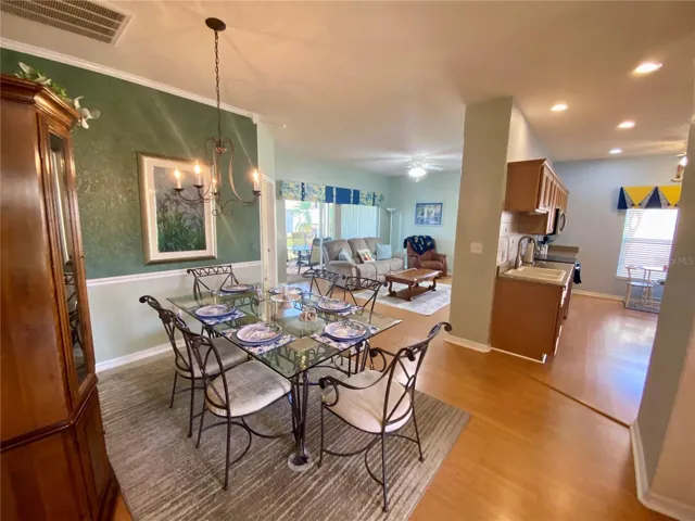 Dining room, living room, and kitchen