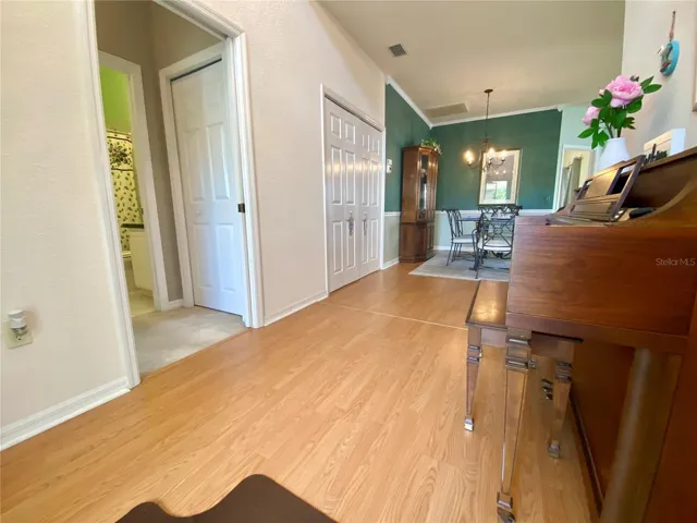 Entrance with guest bedroom to the right