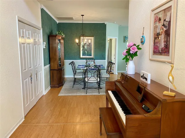 Entrance with natural light from front window above door