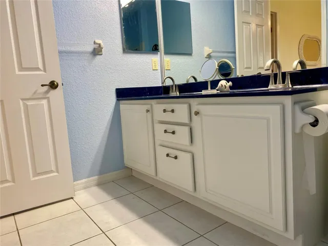 Master bathroom with large vanity and double sinks